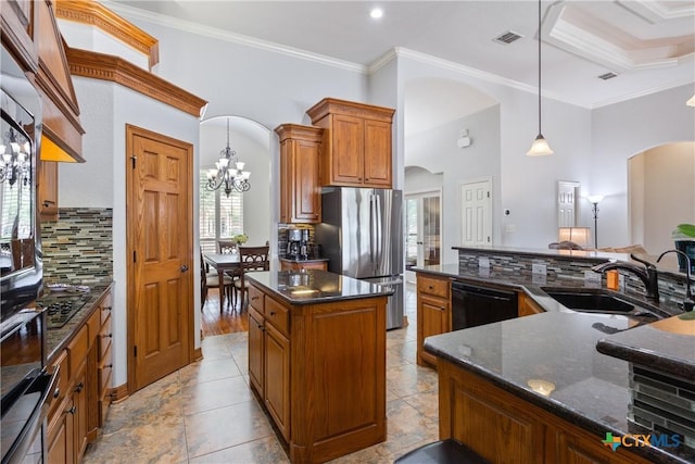 1332 Walker Cir, Salado, TX 76571 - kitchen with black dishwasher, freestanding refrigerator, arched walkways, a sink, and a center island