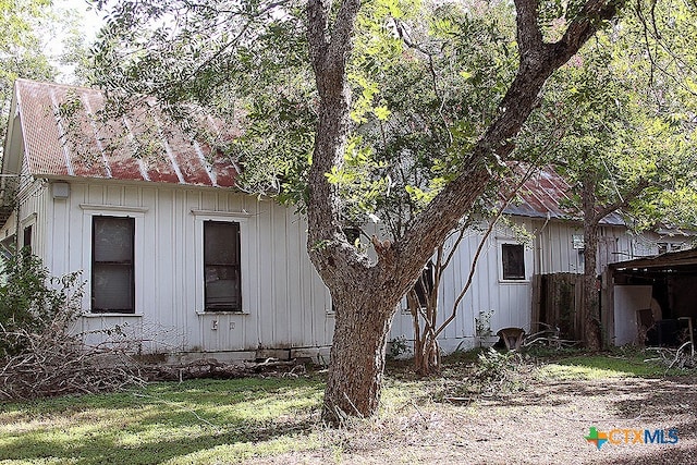 view of home's exterior featuring a yard