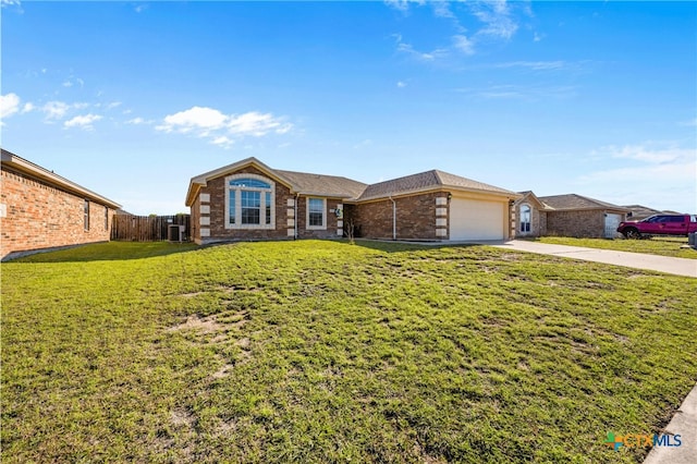 3705 Armstrong County Ct, Killeen, TX 76549 - view of front of property with an attached garage, concrete driveway, and brick siding