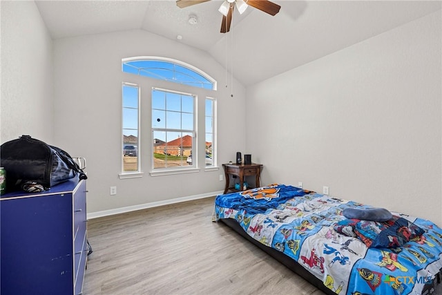 3705 Armstrong County Ct, Killeen, TX 76549 - bedroom featuring lofted ceiling, wood finished floors, a ceiling fan, and baseboards