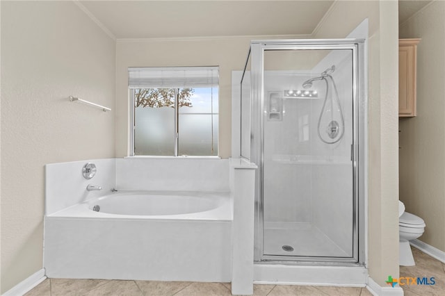 bathroom featuring toilet, shower with separate bathtub, and tile patterned floors