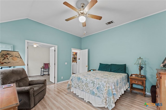 bedroom featuring vaulted ceiling, ceiling fan, and light hardwood / wood-style floors