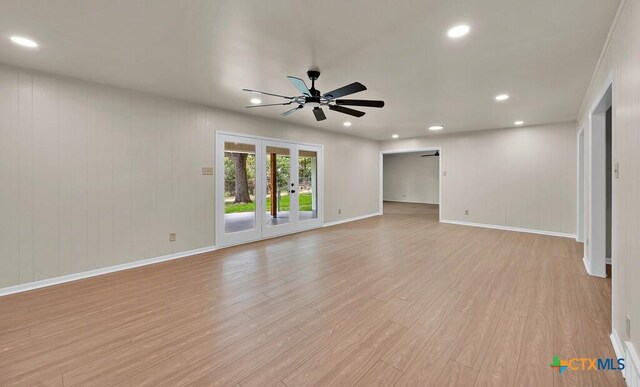 309 E Xavier Ave, Temple, TX 76501 - empty room with ceiling fan, light wood-style floors, recessed lighting, and french doors
