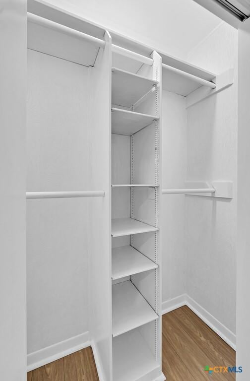 309 E Xavier Ave, Temple, TX 76501 - walk in closet with wood finished floors