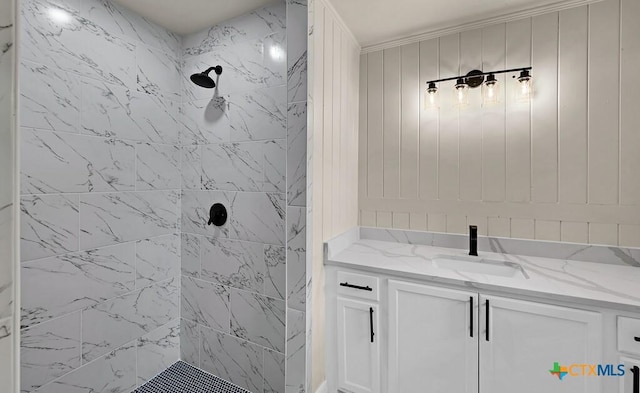 309 E Xavier Ave, Temple, TX 76501 - bathroom featuring a tile shower and vanity