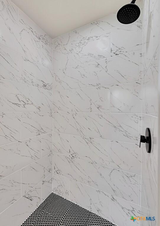 309 E Xavier Ave, Temple, TX 76501 - full bath featuring a tile shower