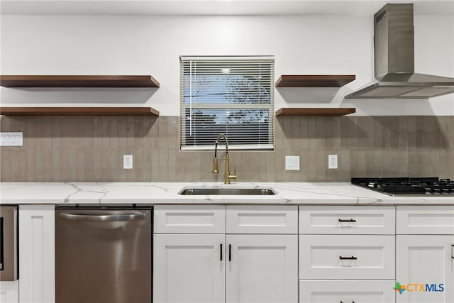 kitchen featuring extractor fan, black gas cooktop, white cabinetry, dishwasher, and sink