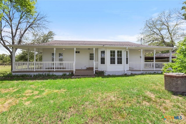 2002 E Young Ave, Temple, TX 76501 - farmhouse with covered porch and a front yard