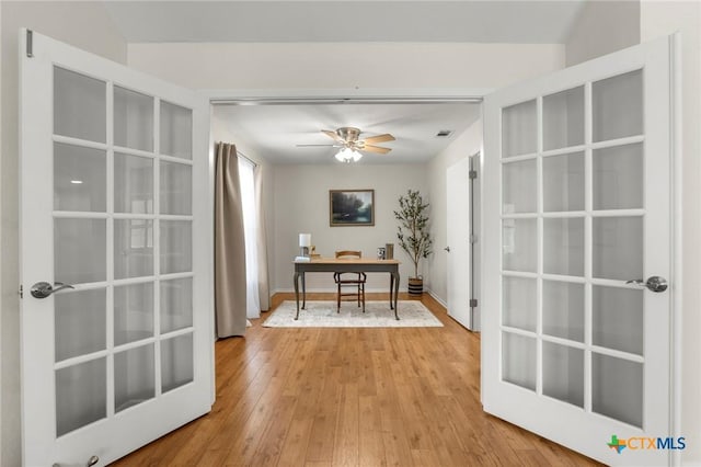 2002 E Young Ave, Temple, TX 76501 - office with light wood-type flooring, a ceiling fan, and french doors