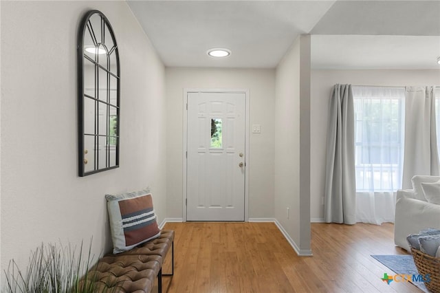 2002 E Young Ave, Temple, TX 76501 - entryway featuring healthy amount of natural light, baseboards, light wood finished floors, and recessed lighting
