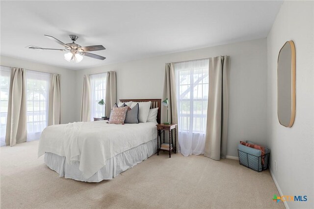 2002 E Young Ave, Temple, TX 76501 - carpeted bedroom featuring ceiling fan and baseboards