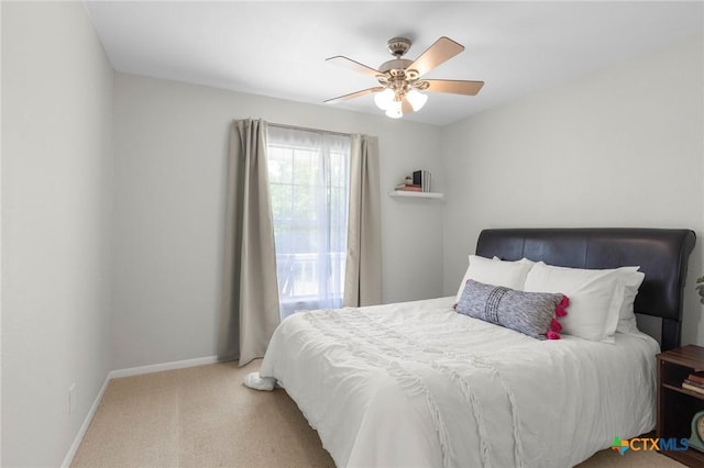 2002 E Young Ave, Temple, TX 76501 - bedroom featuring baseboards, carpet flooring, and a ceiling fan