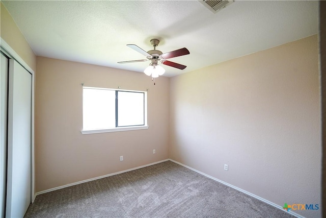 4607 Stanford Dr, Killeen, TX 76542 - unfurnished bedroom with a closet, carpet flooring, baseboards, and a ceiling fan
