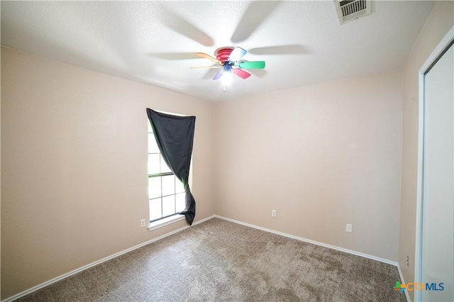 4607 Stanford Dr, Killeen, TX 76542 - spare room featuring a ceiling fan, carpet, and baseboards