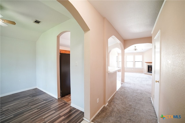 4607 Stanford Dr, Killeen, TX 76542 - hall with baseboards, wood finished floors, and arched walkways