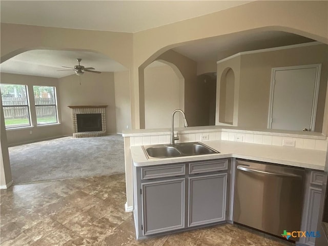 4607 Stanford Dr, Killeen, TX 76542 - kitchen featuring dishwasher, gray cabinets, ceiling fan, a fireplace, and light countertops