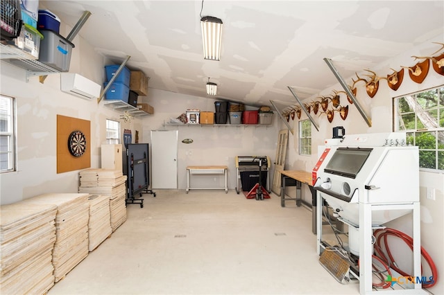 315 Hilltop Rdg, New Braunfels, TX 78132 - below grade area with a wall mounted air conditioner and plenty of natural light