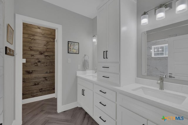 315 Hilltop Rdg, New Braunfels, TX 78132 - bathroom with double vanity, a sink, and baseboards