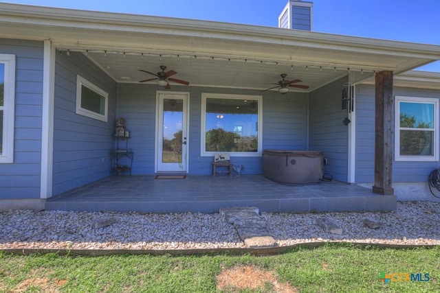 315 Hilltop Rdg, New Braunfels, TX 78132 - entrance to property featuring a patio, a chimney, and ceiling fan