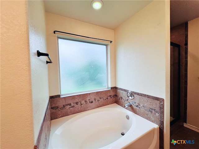 bathroom with a bathing tub