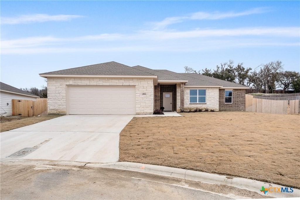 ranch-style house with a garage