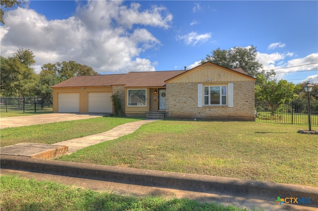 ranch-style home featuring a garage and a front lawn