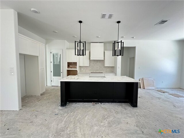 bathroom featuring concrete flooring