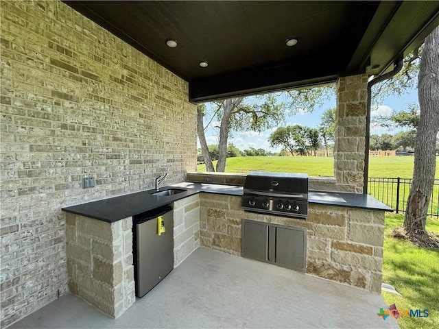 5101 Sunflower Ln, Temple, TX 76502 - view of patio featuring a sink and an outdoor kitchen