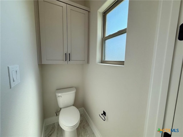 5101 Sunflower Ln, Temple, TX 76502 - bathroom featuring baseboards and marble finish flooring