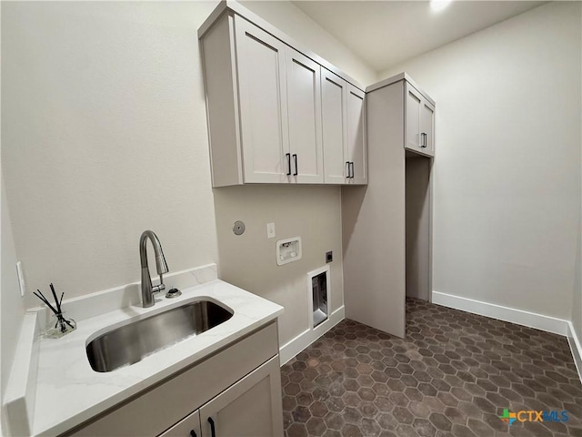 5101 Sunflower Ln, Temple, TX 76502 - laundry room featuring electric dryer hookup, cabinet space, and hookup for a washing machine