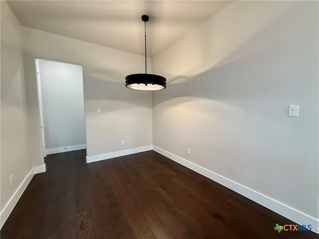 5101 Sunflower Ln, Temple, TX 76502 - empty room with dark wood-style flooring and baseboards