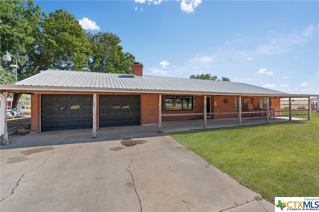 view of front of house with a front lawn and covered porch