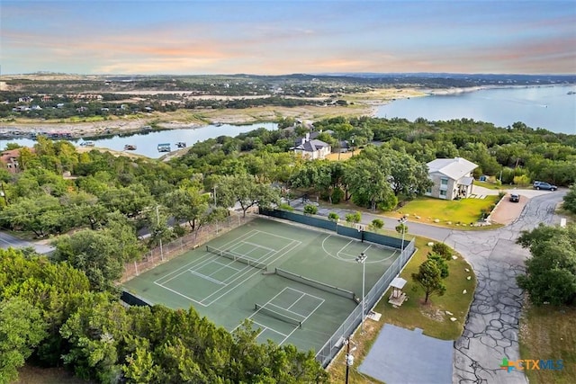 19506 Inverness Dr, Lakeway, TX 78669 - aerial view at dusk featuring a water view