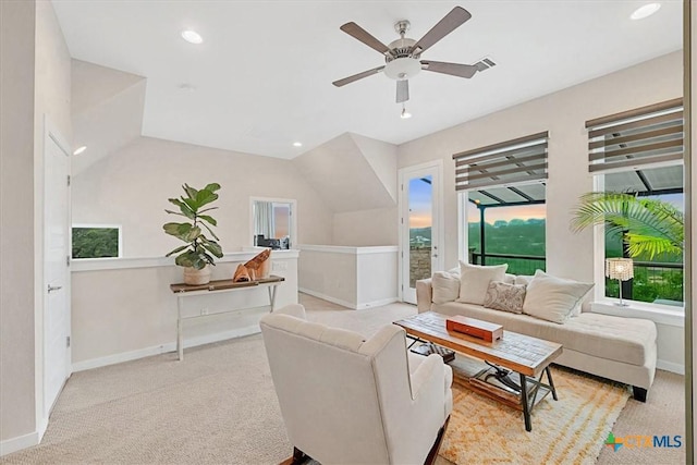 carpeted living room featuring baseboards, ceiling fan, visible vents, and recessed lighting