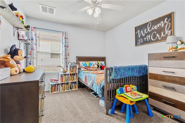 bedroom with ceiling fan and carpet flooring