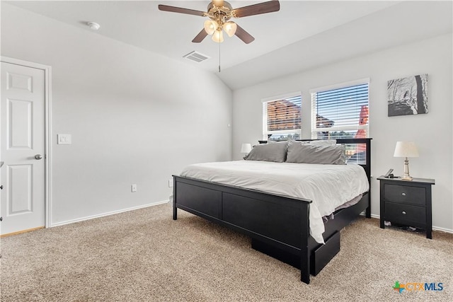 carpeted bedroom featuring ceiling fan and lofted ceiling