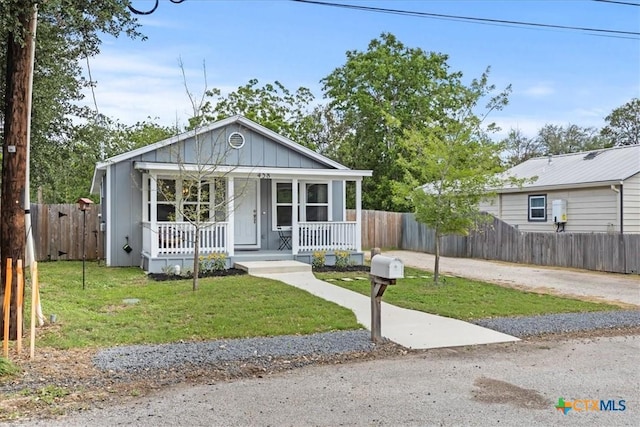 458 Seele St, New Braunfels, TX 78130 - bungalow-style house featuring covered porch, board and batten siding, and driveway