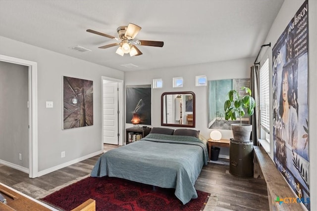 458 Seele St, New Braunfels, TX 78130 - bedroom with wood finished floors, multiple windows, and baseboards