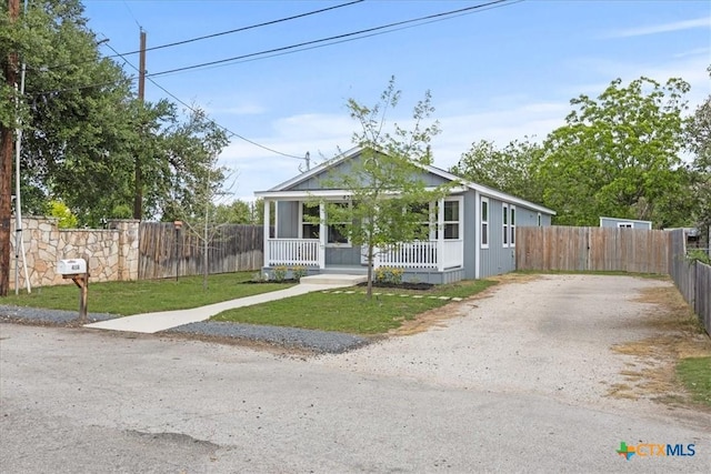 458 Seele St, New Braunfels, TX 78130 - view of front of house featuring a porch and gravel driveway