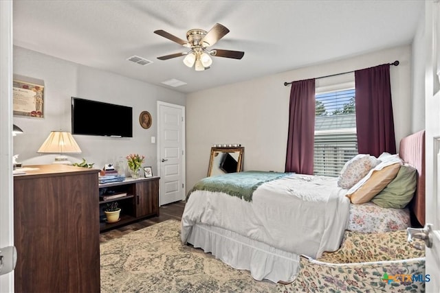 458 Seele St, New Braunfels, TX 78130 - bedroom with wood finished floors and ceiling fan