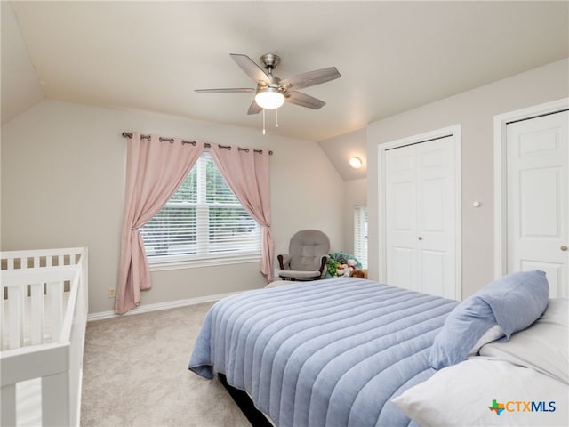 bedroom featuring lofted ceiling, carpet flooring, ceiling fan, and baseboards