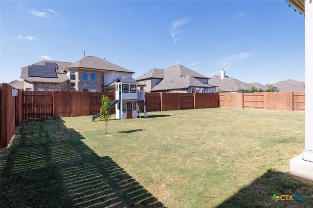 view of yard featuring a playground