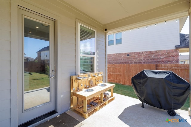 view of patio / terrace with a grill