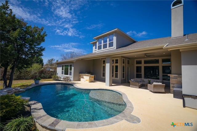 view of pool featuring a ceiling fan, an outdoor living space, a patio area, and a fenced in pool