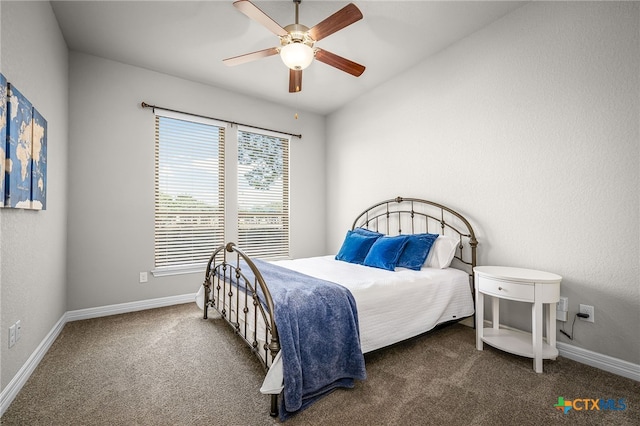 bedroom featuring carpet flooring, ceiling fan, baseboards, and a textured wall