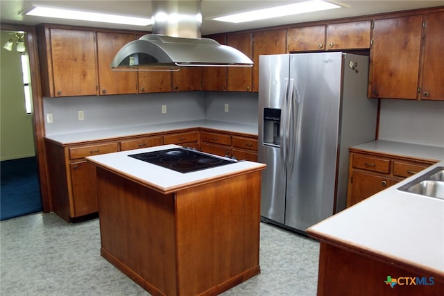 kitchen with electric cooktop, stainless steel fridge with ice dispenser, island exhaust hood, and a kitchen island