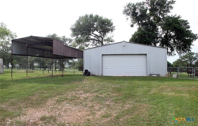 garage featuring a yard