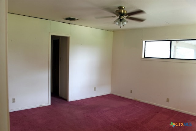 carpeted empty room with ceiling fan