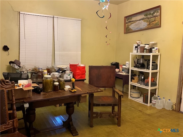 dining space featuring wood-type flooring