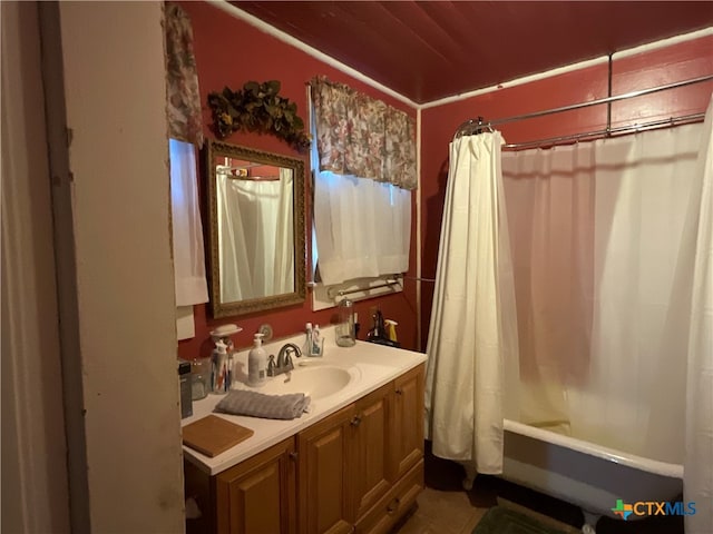 bathroom with vanity and shower / tub combo with curtain